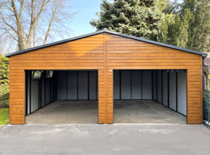 7x6m DELUX mobile garage/workshop/warehouse with gable roof, 2 sectional doors, door, 2 windows, skirting, guttering, horizontal cladding, double paint treated (black) frame structure