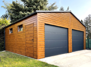 7x6m DELUX mobile garage/workshop/warehouse with gable roof, 2 sectional doors, door, 2 windows, skirting, guttering, horizontal cladding, double paint treated (black) frame structure