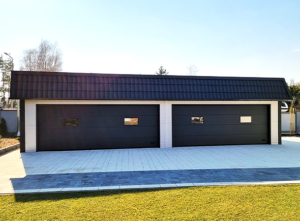 12x6m DELUX insulated workshop / warehouse / mobile garage with custom designed back sloping roof, 2 sectional doors, doors, 5 windows, cornices, guttering, plywood roof cladding, galvanized frame structure