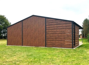 9x7m DELUX mobile garage, with gable roof, sectional door, door, skirting, gutter, vertical cladding, galvanized frame