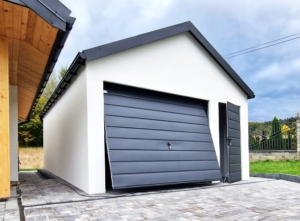 4,5x7m DELUX plastered mobile garage with gable roof, tilting door, door, 2 windows, gutter, skirting, galvanized frame