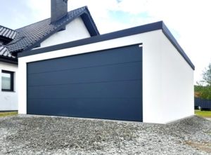 6x5,78m DELUX plastered mobile garage with back sloping roof, sectional door, door, window, gutter, skirting, galvanized frame