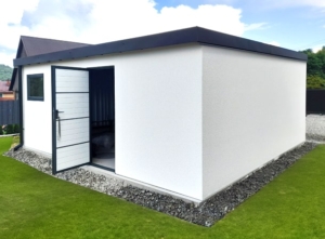 6x5,78m DELUX plastered mobile garage with back sloping roof, sectional door, door, window, gutter, skirting, galvanized frame