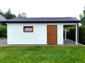 6x7,3m DELUX insulated mobile garage with gable roof, rear overhang, sectional door, door, window, skirting, gutter, galvanized frame