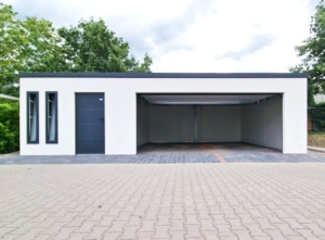 9,5x6,29m DELUX plastered insulated mobile garage with sloping roof, sectional door, 2 doors, 2 windows, partition and separate storage room, guttering, PIR sandwich panel wall and roof construction