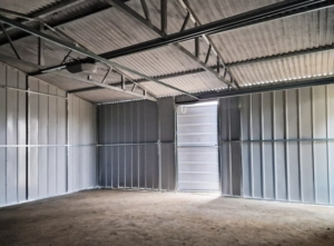 6x6m quality mobile garage, with gable roof, felt cladding, anthracite grey walls, tilting door and door, 2 windows, cornices, guttering, horizontal cladding, galvanized frame