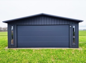 6x6m quality mobile garage, with gable roof, felt cladding, anthracite grey walls, tilting door and door, 2 windows, cornices, guttering, horizontal cladding, galvanized frame