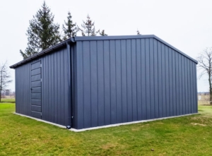 6x6m quality mobile garage, with gable roof, felt cladding, anthracite grey walls, tilting door and door, 2 windows, cornices, guttering, horizontal cladding, galvanized frame